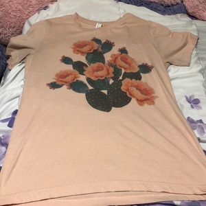 A adorable cactus shirt.